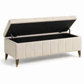 Panca in tessuto beige con gambe in legno massello